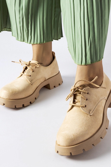 Bottines beiges à semelle...