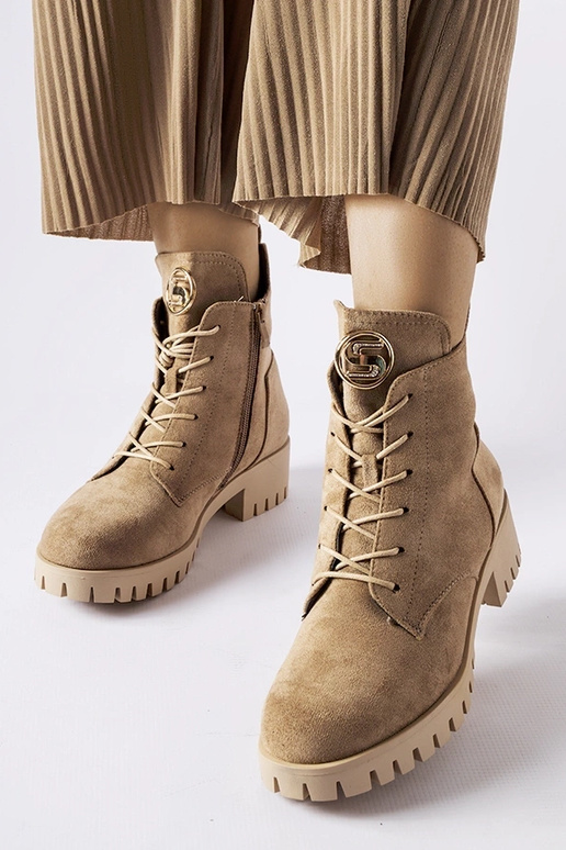 Bottes isolées en daim artificiel... Bottes isolées en daim artificiel...