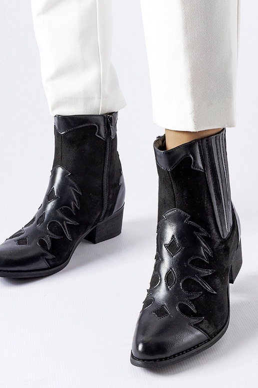 Bottes de cowboy noires à petit talon...