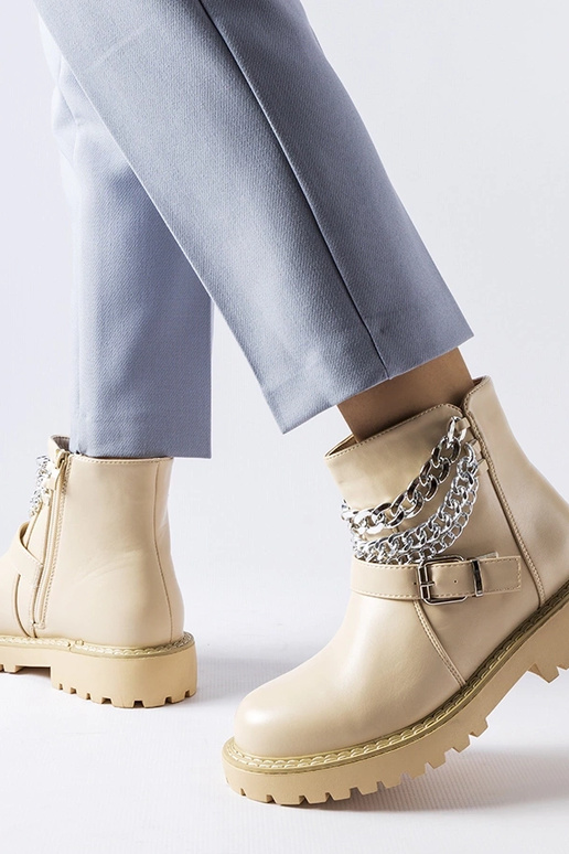 Beige Stiefeletten mit Zierketten...