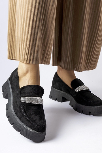 Mocassins noirs à semelle...