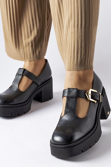 Bottines noires en cuir,...