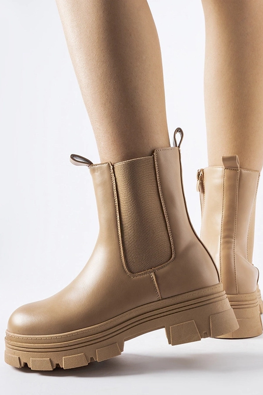 Beige Stiefeletten auf der...