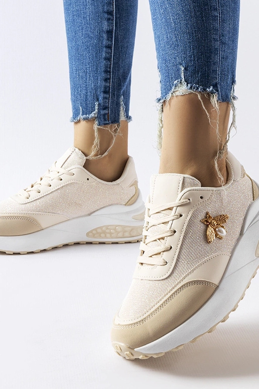Beige-weiße Sneaker mit dekorativem...