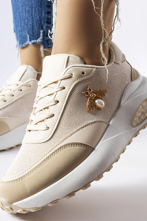 Beige-weiße Sneaker mit dekorativem...