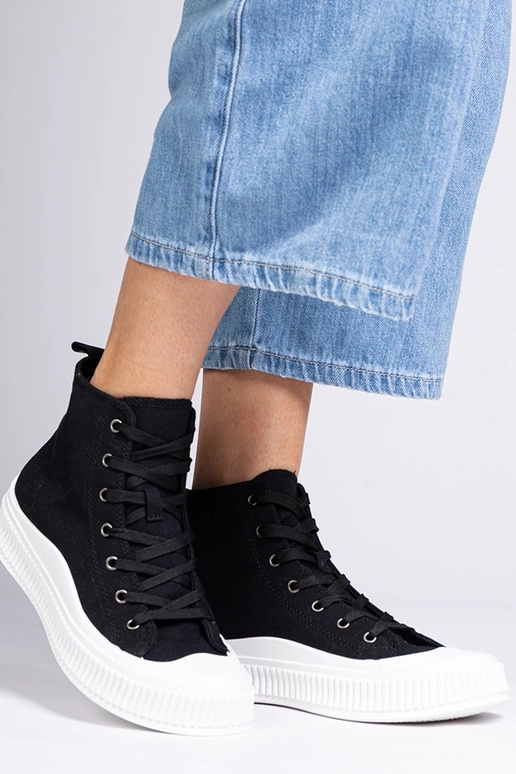 Bottines hautes noires sur...