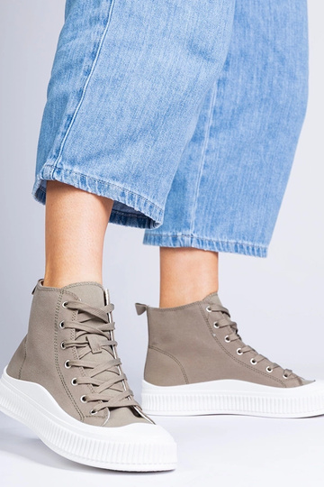 Groene hoge schoenen op een... 2