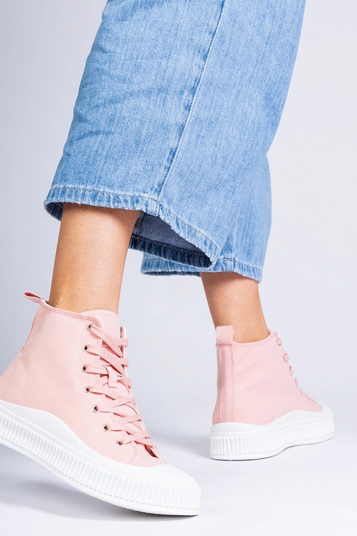 Roze hoge schoenen op een platform,...