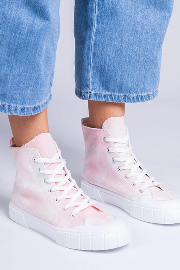 Roze schoenen boven de...