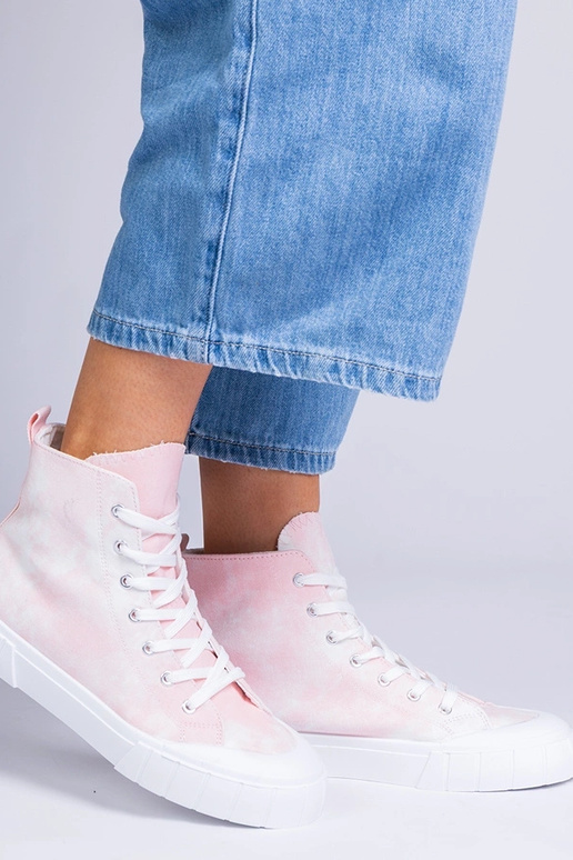 Bottines roses au-dessus de la...