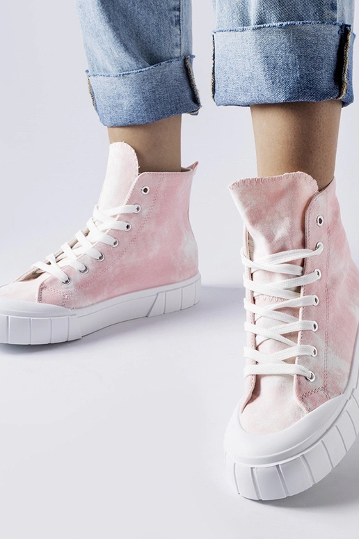 Bottines roses au-dessus de la...