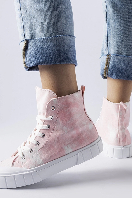 Bottines roses au-dessus de la...