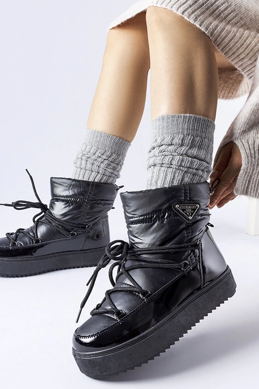 Bottes de neige isolées noires avec...