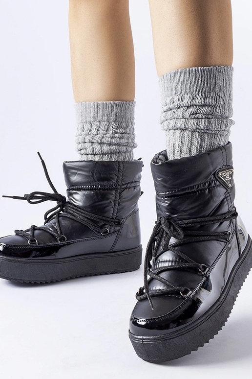 Bottes de neige isolées noires avec...