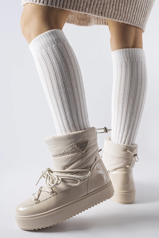 Bottes de neige isolées beiges avec...