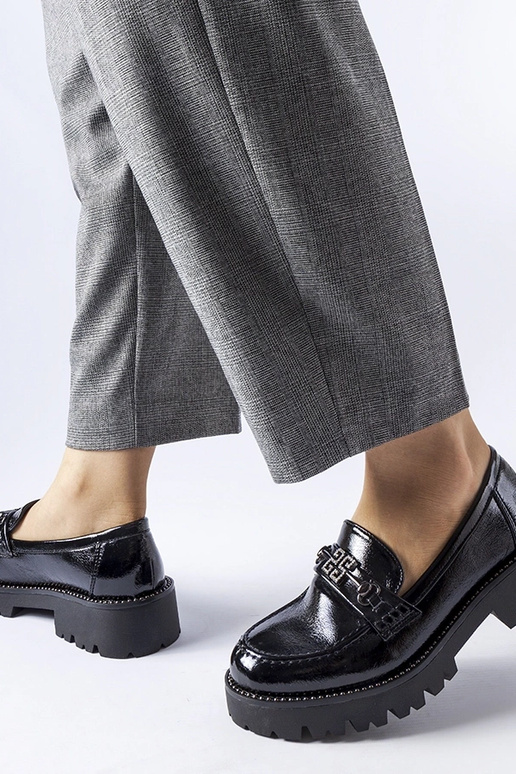 Zwarte lakleren instappers met... Zwarte lakleren instappers met...