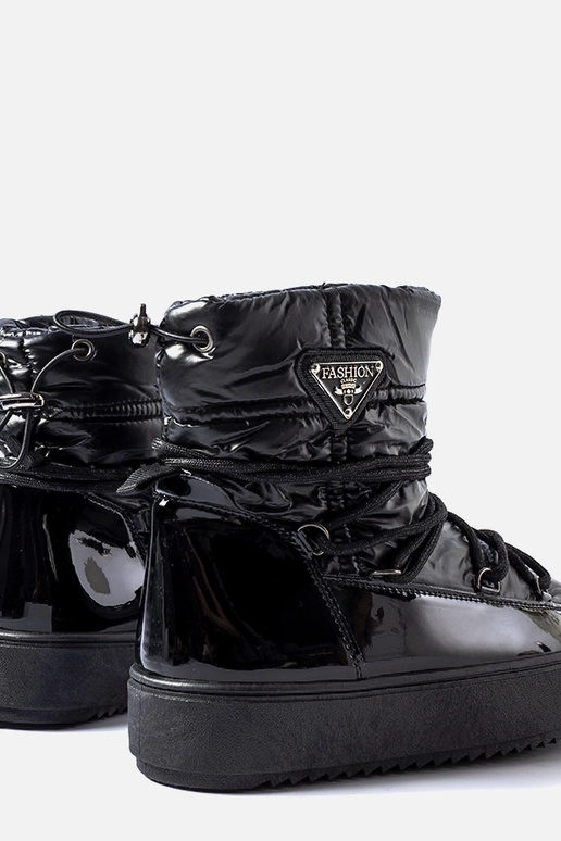 Bottines isolées noires en caoutchouc...