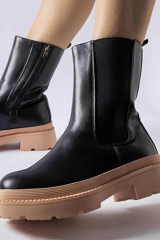 Schwarze Stiefeletten mit hellrosa...