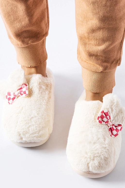 Chaussons blancs isolés pour femmes...