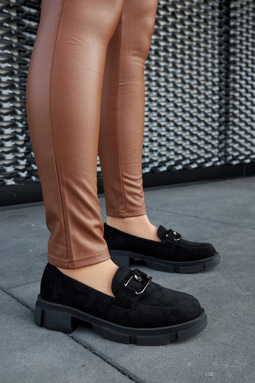 Mocassins noirs massifs avec boucle... Mocassins noirs massifs avec boucle...