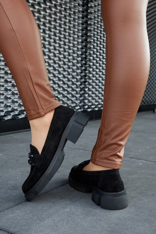 Mocassins noirs massifs avec boucle... Mocassins noirs massifs avec boucle...