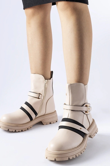 Bottes isolées beiges Laderoute