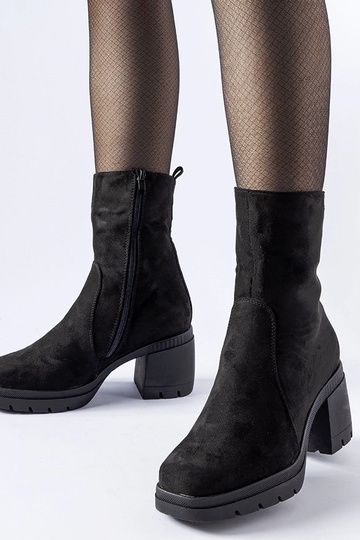 Bottines noires à talon en...