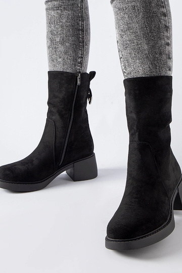 Bottines noires à talon en...