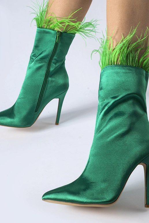 Groene enkellaarsjes versierd met...