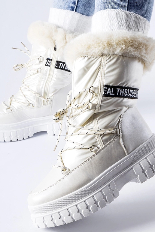 Beige verwarmde sneeuwlaarzen met de...