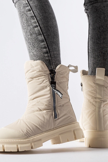 Beige isolierte gesteppte... 2