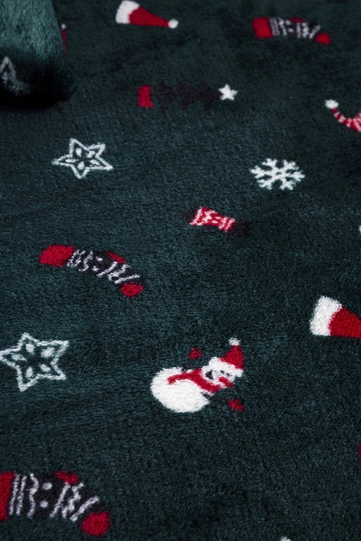 Couverture verte avec motifs de Noël...