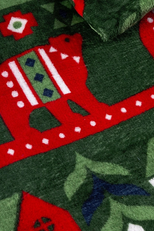 Couverture verte aux motifs de Noël Mary