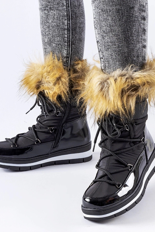 Bottes de neige en cuir verni noir...