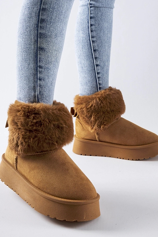 Bottines de neige brunes ornées de...