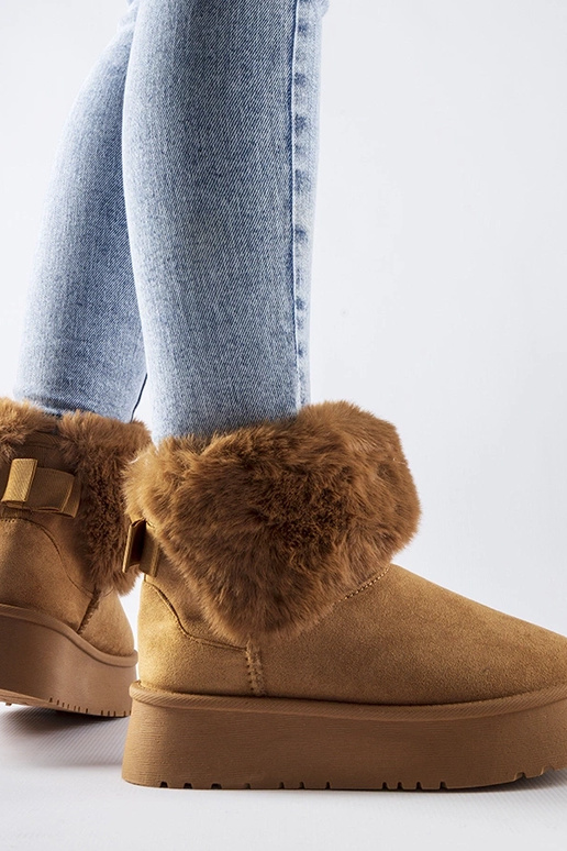 Bronskleurige sneeuwlaarzen versierd...