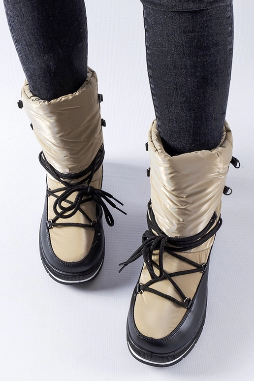 Bottines de neige beiges foncées sur...