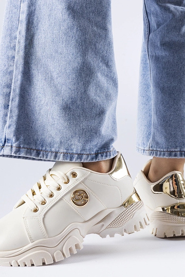 Beige sneakers med en...