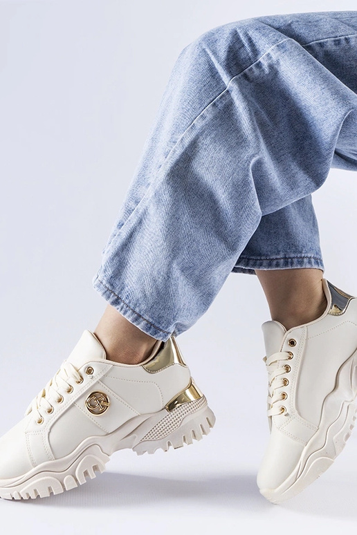 Beige sneakers med en massiv Arpaia-sål