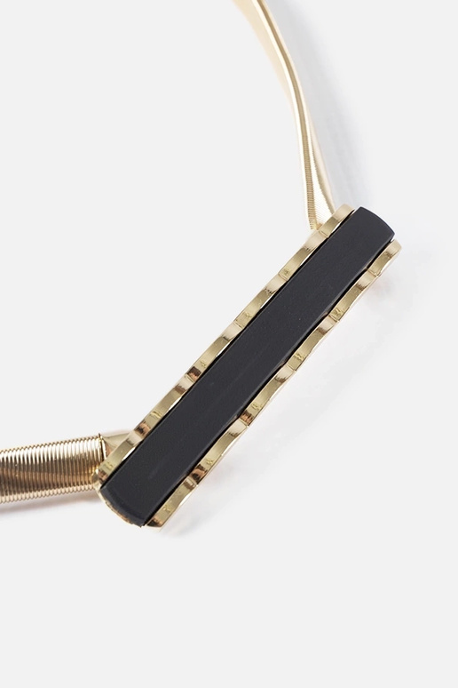 Ceinture élastique dorée avec boucle... Ceinture élastique dorée avec boucle...