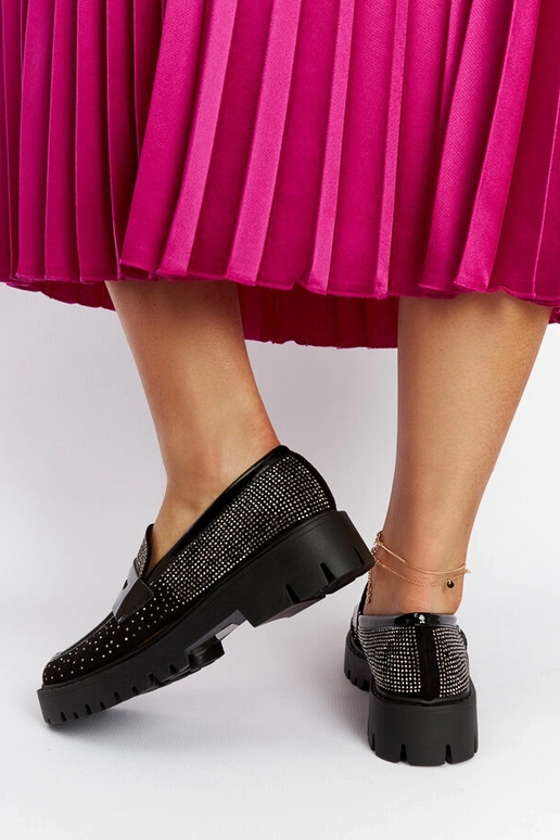 Sorte mokkasiner dekoreret med... Sorte mokkasiner dekoreret med...