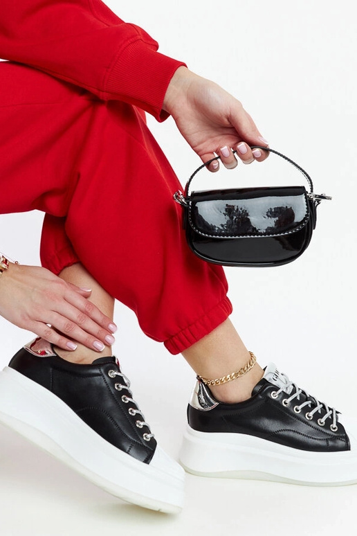 Schwarze Plateau-Sneakers GOE NN2N4034 Schwarze Plateau-Sneakers GOE NN2N4034