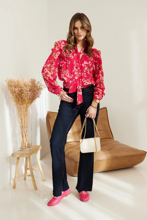 Rosafarbene Loafer mit einer... Rosafarbene Loafer mit einer...