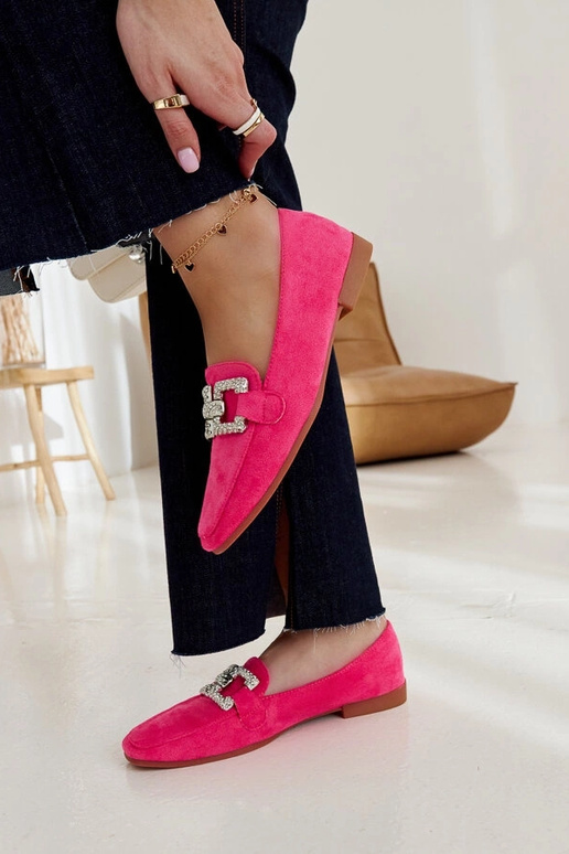 Rosafarbene Loafer mit einer... Rosafarbene Loafer mit einer...