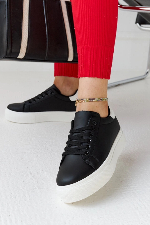 Schwarz-weiße Sneaker mit dicker...