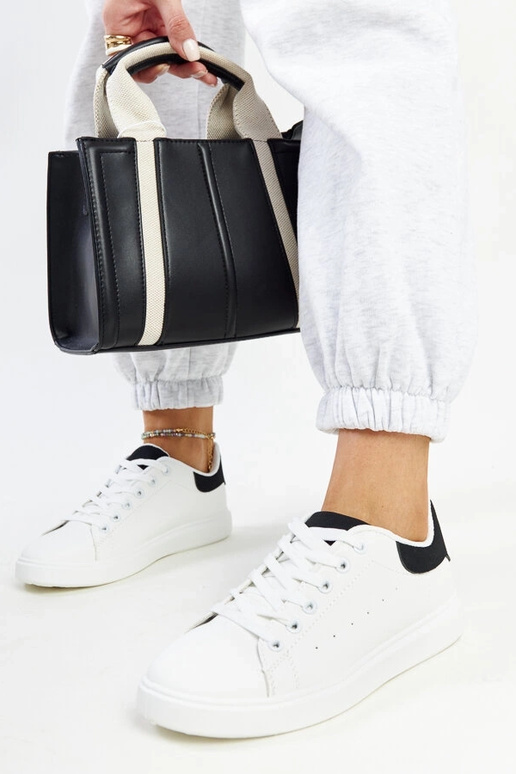 Schwarze und weiße Ariam Plateau-Sneaker