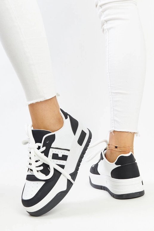Schwarz-weiße Sneaker mit dicker...