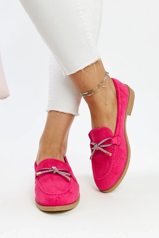 Donkerroze mocassins met decoratieve... Donkerroze mocassins met decoratieve...