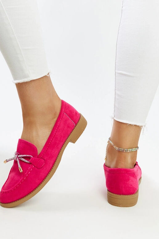 Donkerroze mocassins met decoratieve... Donkerroze mocassins met decoratieve...