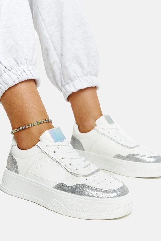 Baskets blanches et argentées avec...